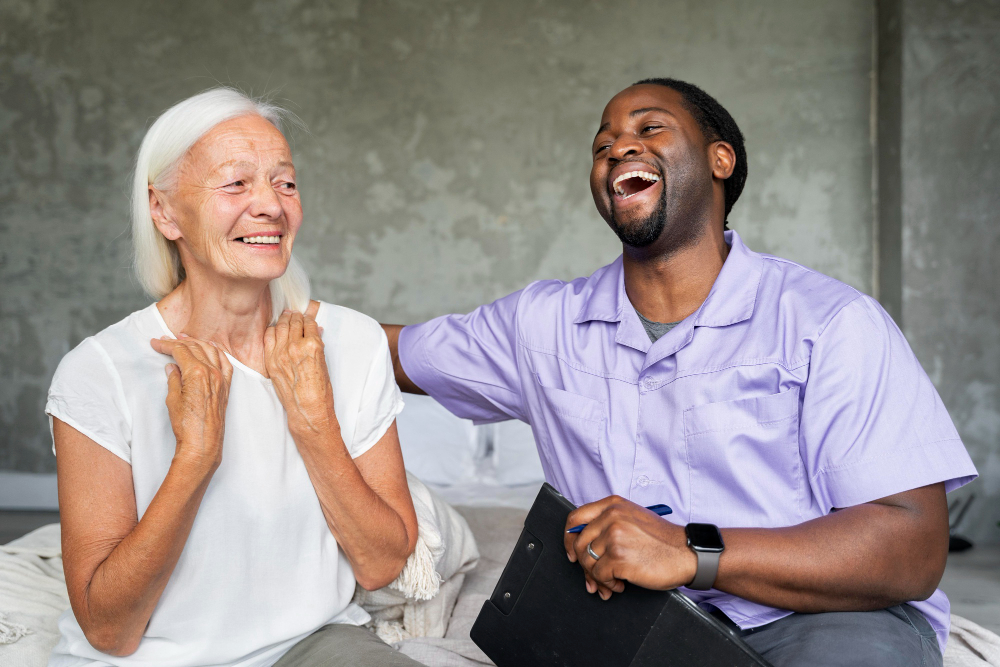Happy elderly woman and caretaker